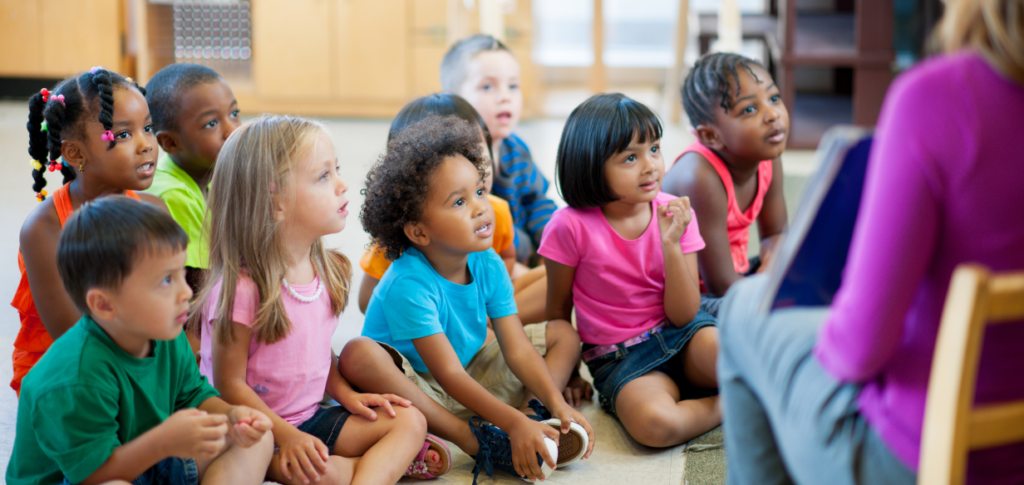 Classroom of children from boosted childcare enrollment marketing